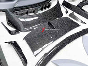 WIDE CARBON BODY KIT FOR BENTLEY BENTAYGA W12 2020+

Set includes:

Front bumper assembly
Hood / Bonnet
Carbon Mirror Covers
Front Fender Flares
Side Skirts
Roof Spoiler
Rear Spoiler
Rear Fender Flares
Rear Bumper Assembly

Rear Diffuser

Material: Dry carbon

NOTE: Professional installation is required.