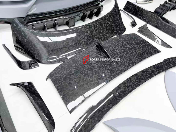 WIDE CARBON BODY KIT FOR BENTLEY BENTAYGA W12 2020+

Set includes:

Front bumper assembly
Hood / Bonnet
Carbon Mirror Covers
Front Fender Flares
Side Skirts
Roof Spoiler
Rear Spoiler
Rear Fender Flares
Rear Bumper Assembly

Rear Diffuser

Material: Dry carbon

NOTE: Professional installation is required.