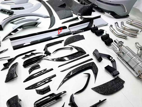 WIDE CARBON BODY KIT FOR BENTLEY BENTAYGA W12 2020+

Set includes:

Front bumper assembly
Hood / Bonnet
Carbon Mirror Covers
Front Fender Flares
Side Skirts
Roof Spoiler
Rear Spoiler
Rear Fender Flares
Rear Bumper Assembly

Rear Diffuser

Material: Dry carbon

NOTE: Professional installation is required.