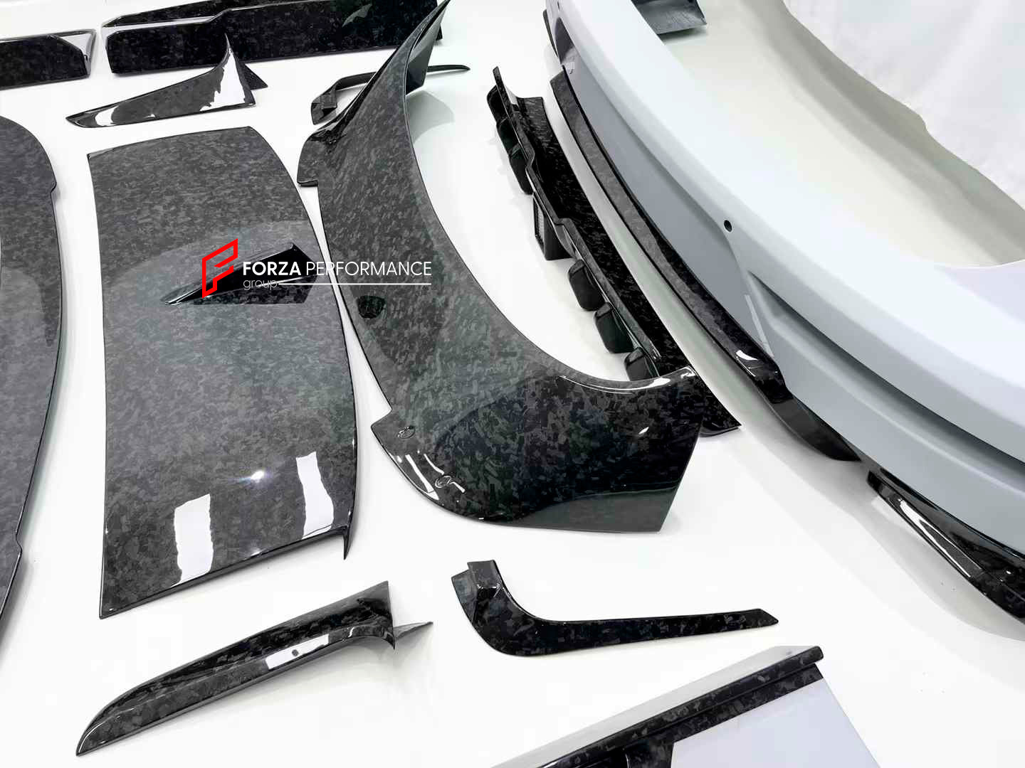 WIDE CARBON BODY KIT FOR BENTLEY BENTAYGA W12 2020+

Set includes:

Front bumper assembly
Hood / Bonnet
Carbon Mirror Covers
Front Fender Flares
Side Skirts
Roof Spoiler
Rear Spoiler
Rear Fender Flares
Rear Bumper Assembly

Rear Diffuser

Material: Dry carbon

NOTE: Professional installation is required.