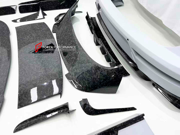 WIDE CARBON BODY KIT FOR BENTLEY BENTAYGA W12 2020+

Set includes:

Front bumper assembly
Hood / Bonnet
Carbon Mirror Covers
Front Fender Flares
Side Skirts
Roof Spoiler
Rear Spoiler
Rear Fender Flares
Rear Bumper Assembly

Rear Diffuser

Material: Dry carbon

NOTE: Professional installation is required.