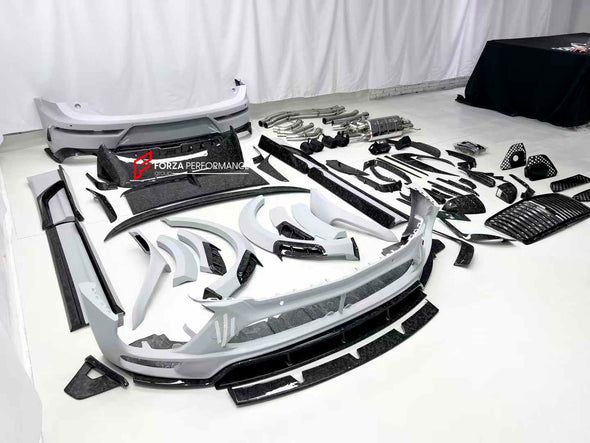 WIDE CARBON BODY KIT FOR BENTLEY BENTAYGA W12 2020+

Set includes:

Front bumper assembly
Hood / Bonnet
Carbon Mirror Covers
Front Fender Flares
Side Skirts
Roof Spoiler
Rear Spoiler
Rear Fender Flares
Rear Bumper Assembly

Rear Diffuser

Material: Dry carbon

NOTE: Professional installation is required.