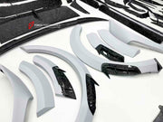 WIDE CARBON BODY KIT FOR BENTLEY BENTAYGA W12 2020+

Set includes:

Front bumper assembly
Hood / Bonnet
Carbon Mirror Covers
Front Fender Flares
Side Skirts
Roof Spoiler
Rear Spoiler
Rear Fender Flares
Rear Bumper Assembly

Rear Diffuser

Material: Dry carbon

NOTE: Professional installation is required.