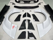 CARBON WIDE BODY KIT for BMW M4 G82 2021 - 2024 FORZA PERFORMANCE custom fit Adro Style

Set includes:
Front Lip
Front Bumper Assembly
Front Grille
Hood Bonnet
Front Fenders
Side Skirts
Rear Fenders
Rear Spoiler Wing
Rear Diffuser

Material: Carbon, Plastic

NOTE: Professional installation is required.