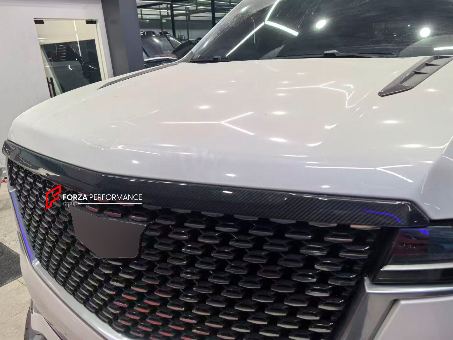 WIDE BODY KIT for CADILLAC ESCALADE 2021 - 2024

Set includes:


Front Lip
Front Grille Cover
Roof Spoiler
Rear Diffuser
Exhaust Tips

Material:Carbon Fiber

Note: Professional installation is required.

CONTACT US FOR PRICING