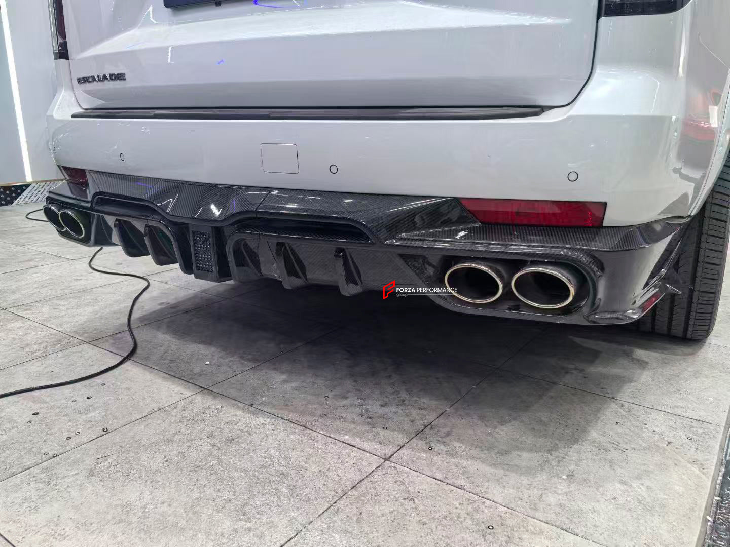 WIDE BODY KIT for CADILLAC ESCALADE 2021 - 2024

Set includes:


Front Lip
Front Grille Cover
Roof Spoiler
Rear Diffuser
Exhaust Tips

Material:Carbon Fiber

Note: Professional installation is required.

CONTACT US FOR PRICING