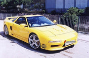 Wide Body Kit for Honda NSX NA1
Set includes:

Front Bumper
Hood Bonnet
Side Skirts
Rear Fender
Rear Spoiler Wing
Rear Bumper
NOTE: Professional installation is required.