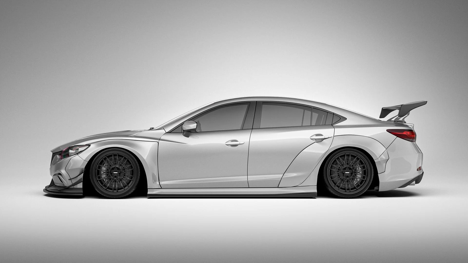 WIDE BODY KIT for MAZDA 6 ATENZA GJ GL 2015 - 2018

Set includes:

Front Lip
Front Bumper Assembly

Hood / Bonnet

Front Fenders
Side Skirts

Rear Fenders
Rear Wing Spoiler
Rear Trunk Spoiler
Rear Diffuser

Material: Wet Carbon with Fiberglass

NOTE:&nbsp;Professional installation is required.&nbsp;

Why “Contact Us for Pricing”?

We don’t display fixed prices because our goal is to offer you the most competitive deal possible. Product costs often decrease over time, and by requesting a quote, you’ll receiv