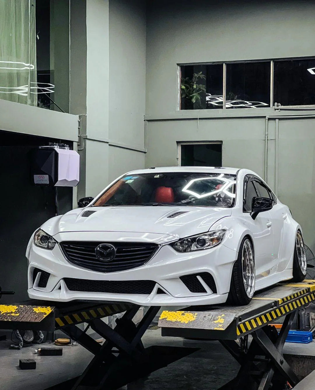 WIDE BODY KIT for MAZDA 6 ATENZA GJ GL 2015 - 2018

Set includes:

Front Lip
Front Bumper Assembly

Hood / Bonnet

Front Fenders
Side Skirts

Rear Fenders
Rear Wing Spoiler
Rear Trunk Spoiler
Rear Diffuser

Material: Wet Carbon with Fiberglass

NOTE:&nbsp;Professional installation is required.&nbsp;

Why “Contact Us for Pricing”?

We don’t display fixed prices because our goal is to offer you the most competitive deal possible. Product costs often decrease over time, and by requesting a quote, you’ll receiv