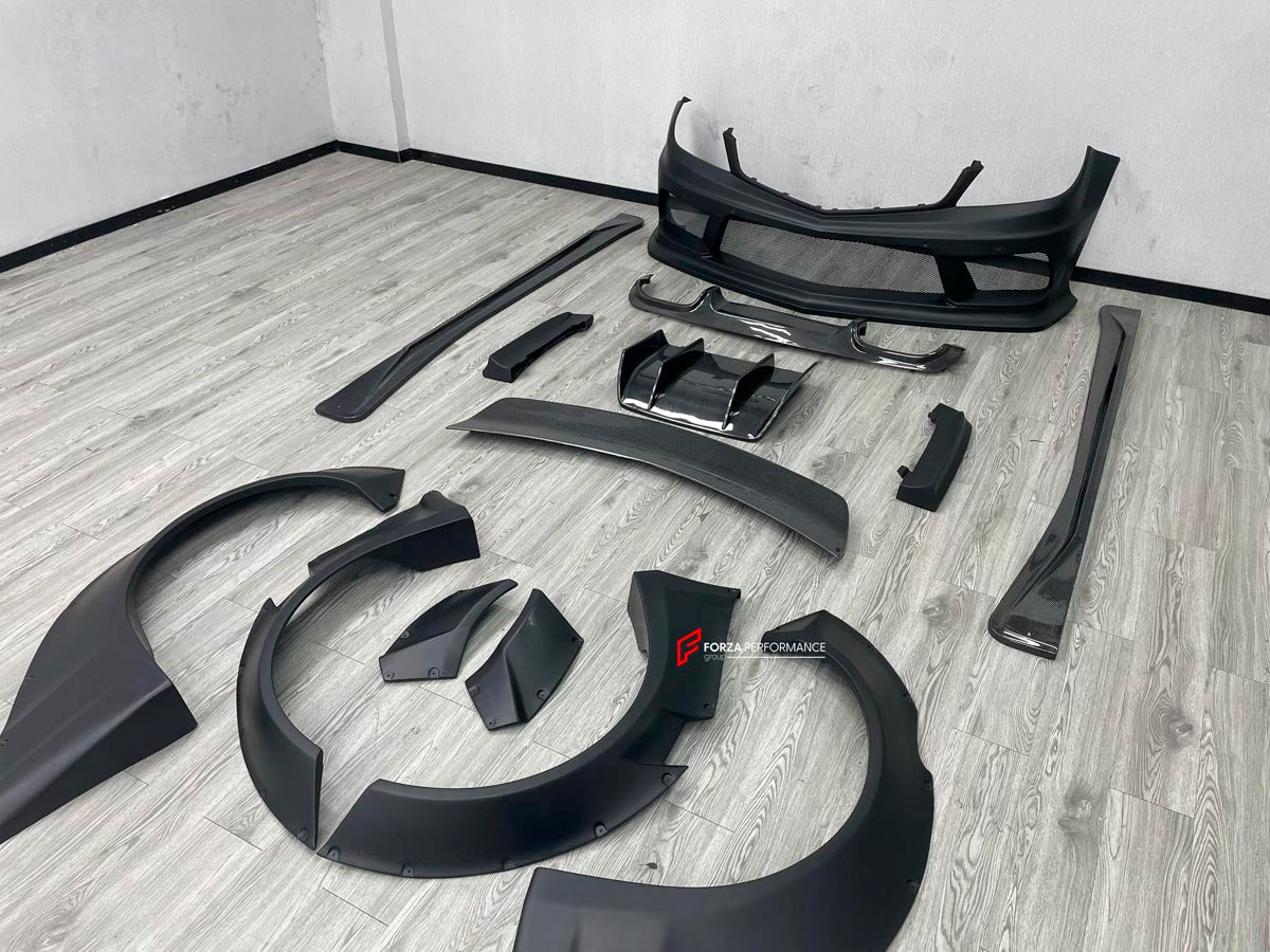 WIDE BODY KIT for MERCEDES BENZ C CLASS W204 C63 2 DOOR 4 DOOR 2007 - 2014
Set includes:

Front Bumper
Front Lip
Front Canards
Fender Flares (Front and Rear)
Side Skirts
Rear Diffuser
Material: FRP and Carbon

NOTE: Professional installation is required.