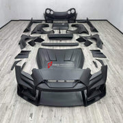 WIDE BODY KIT for NISSAN GT-R R35 2007+ FORZA PERFORMANCE custom fit LB Style

Set includes:
Front Lip
Front Bumper Assembly
Hood Bonnet
Front Fenders
Fender Flares
Side Skirts
Rear Fenders
Rear Spoiler Wing
Rear Bumper Assembly
Rear Diffuser

Material: Plastic

NOTE: Professional installation is required.