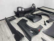 WIDE BODY KIT for NISSAN GT-R R35 2007+ FORZA PERFORMANCE custom fit LB Style

Set includes:
Front Lip
Front Bumper Assembly
Hood Bonnet
Front Fenders
Fender Flares
Side Skirts
Rear Fenders
Rear Spoiler Wing
Rear Bumper Assembly
Rear Diffuser

Material: Plastic

NOTE: Professional installation is required.