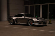 WIDE BODY KIT for PORSCHE 911 997 2004 - 2013 FORZA PERFORMANCE custom fit Tiganism Style

Set includes:
Front Lip
Front Bumper Assembly
Hood Bonnet
Front Fenders
Side Skirts
Rear Fender Flares
Rear Spoiler Wing
Rear Bumper
Rear Diffuser

Material: Plastic

NOTE: Professional installation is required.