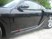 WIDE BODY KIT for Porsche Cayman 987 2009 - 2011
Set includes:

Front Bumper
Front Fender Flares
Side Skirts
Rear Fender Flares
Rear Bumper
Rear Spoiler Wing
Material: Plastic

NOTE: Professional installation is required.
