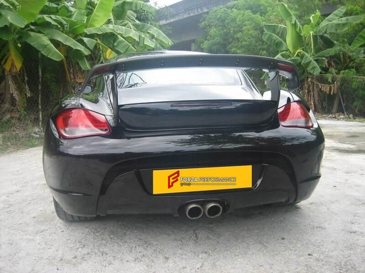 WIDE BODY KIT for Porsche Cayman 987 2009 - 2011
Set includes:

Front Bumper
Front Fender Flares
Side Skirts
Rear Fender Flares
Rear Bumper
Rear Spoiler Wing
Material: Plastic

NOTE: Professional installation is required.