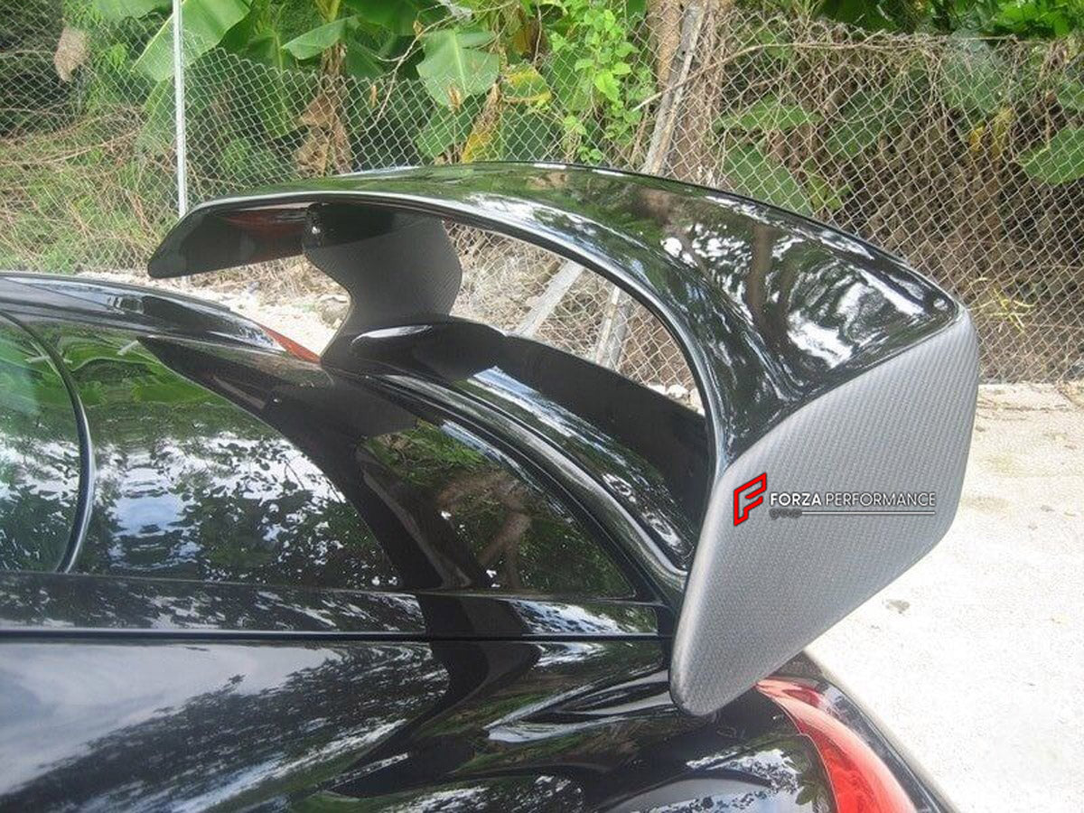 WIDE BODY KIT for Porsche Cayman 987 2009 - 2011
Set includes:

Front Bumper
Front Fender Flares
Side Skirts
Rear Fender Flares
Rear Bumper
Rear Spoiler Wing
Material: Plastic

NOTE: Professional installation is required.
