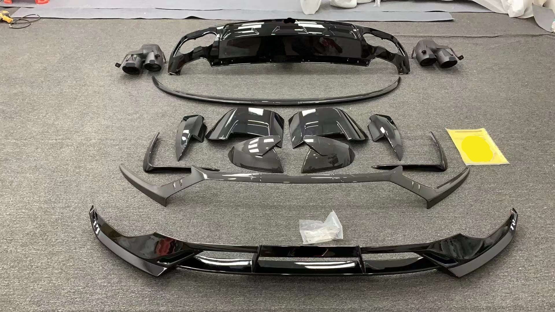 CARBON BODY KIT for AUDI Q5 FY 2020+

Set includes:

Front Lip
Front Bumper Canards
Roof Spoiler
Rear Trunk Spoiler
Rear Diffuser
Rear Diffuser Canards
Exhaust Tips

Material: Plastic+ Carbon Fiber

NOTE: Professional installation is required