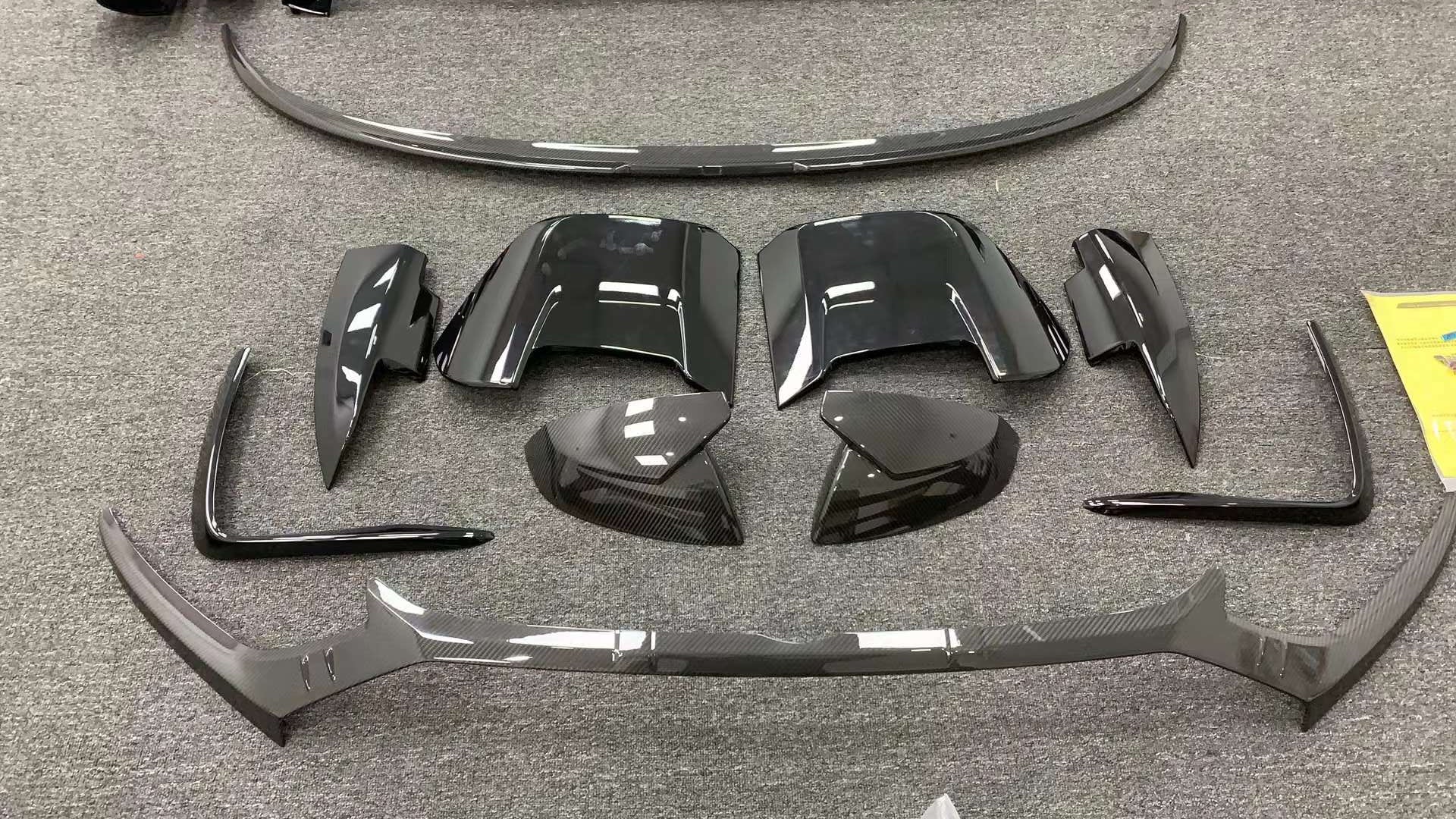 CARBON BODY KIT for AUDI Q5 FY 2020+

Set includes:

Front Lip
Front Bumper Canards
Roof Spoiler
Rear Trunk Spoiler
Rear Diffuser
Rear Diffuser Canards
Exhaust Tips

Material: Plastic+ Carbon Fiber

NOTE: Professional installation is required
