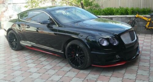 BODY KIT for BENTLEY CONTINENTAL GT 2003-2011

Set includes:

Front Bumper
Fog Lamps
Side Skirts
Rear Bumper
Stop Signal Light for the Rear Bumper

Trunk Spoiler

Material: Fiberglass.

NOTE: Professional installation is required.