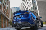 Forza Carbon Body Kit Design for Tesla Model Y  Set includes:  Front lip Side skirts  Rear diffuser Rear spoiler