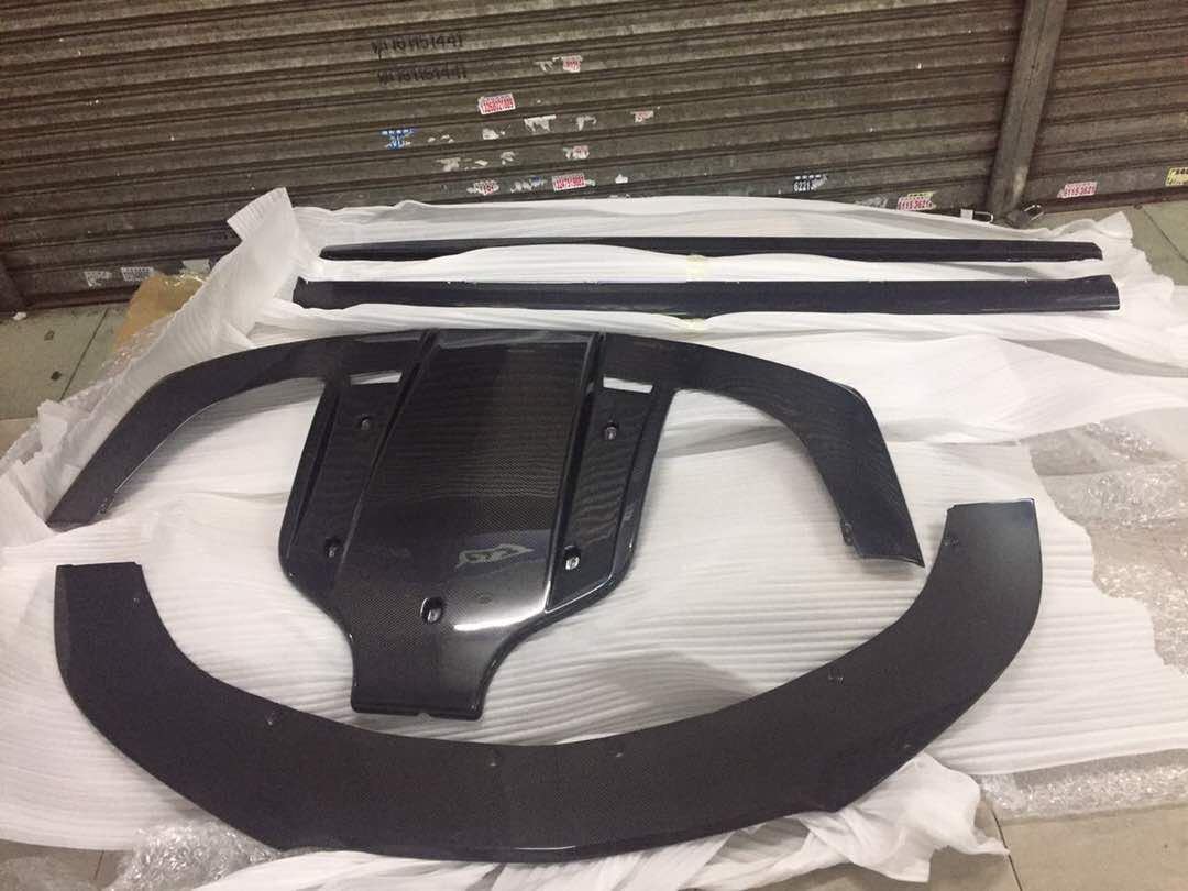 CARBON FIBER BODY KIT FOR BENTLEY CONTINENTAL GT V8 W12 2011-2015

Set includes:
Carbon Front lip
Carbon Side skirts addon
Carbon Rear diffuser.&nbsp;

Material:&nbsp;&nbsp;Carbon Fiber.&nbsp;

Note: Professional installation is required. Cutting of rear bumper light bracket is required. Sometimes need cut new diffuser locally to clear the rear suspension. Carbon rear diffuser available in two types: for V8 and W12 engines. Please specify your engine type when placing an order.