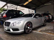 CARBON FIBER BODY KIT FOR BENTLEY CONTINENTAL GT V8 W12 2011-2015

Set includes:
Carbon Front lip
Carbon Side skirts addon
Carbon Rear diffuser.&nbsp;

Material:&nbsp;&nbsp;Carbon Fiber.&nbsp;

Note: Professional installation is required. Cutting of rear bumper light bracket is required. Sometimes need cut new diffuser locally to clear the rear suspension. Carbon rear diffuser available in two types: for V8 and W12 engines. Please specify your engine type when placing an order.