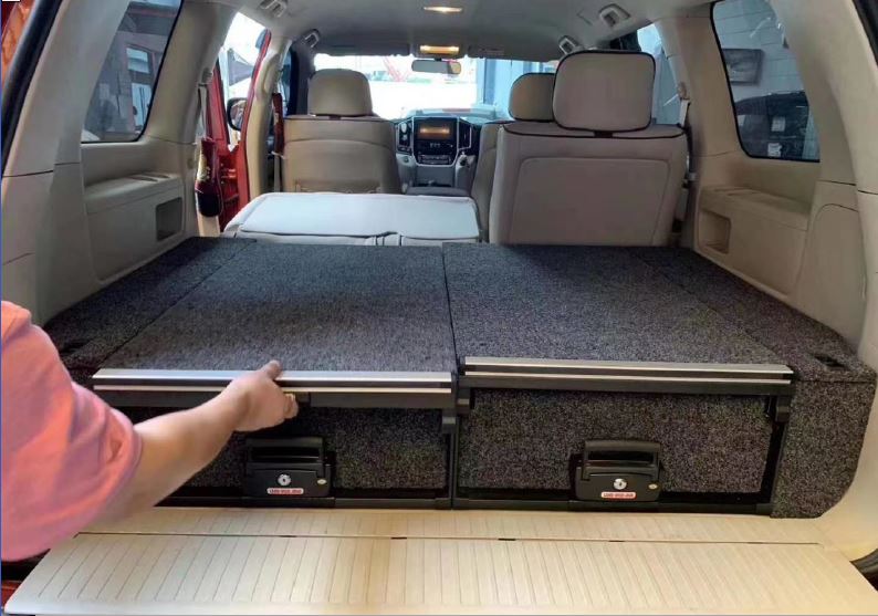 Deployable Slide Drawer Systems For Land Cruiser 200 LC200easily accessible storage space in your car. Designed solidly for tough for both on and off-road travel.  Measurements: Fixed 1000*530*275mm / Roller 1000*530*275/150mm  Which drawers are best for me?  We have a turnkey solution and you are able to modify the whole drawers system with:  - Sink faucet  - Kitchen   - Barrier  - Slide floor  - Table Board / Cutting board  - Fridge 