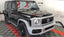 FRONT GRILLE AND HEADLIGHT COVERS G63 STYLE for MERCEDES BENZ G CLASS W463A W464 G350 G550 G63 2018 - 2024
Set includes:

Front Grille with Logo
Headlight Covers
Material: Plastic PP

NOTE: Professional installation is required.