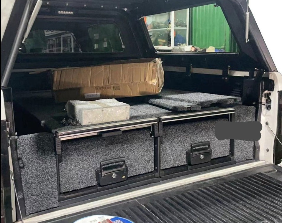 Slide Kitchen Drawer Systems For Ford F250 by Forza Performance  Simplify the storage and organization of equipment and valuables. These lockable drawers with integrated deck and faceplates were designed specifically for the Ford F250. Hide the contents from prying eyes, while creating a more convenient and easily accessible storage space in your car. Designed solidly for tough for both on and off-road travel.