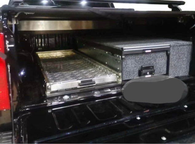 Slide Kitchen Drawer Systems For Nissan Navara D22/D23/D40 by Forza Performance  Simplify the storage and organization of equipment and valuables. These lockable drawers with integrated deck and faceplates were designed specifically for the Nissan Navara D22/D23/D40. Hide the contents from prying eyes, while creating a more convenient and easily accessible storage space in your car. Designed solidly for tough for both on and off-road travel.