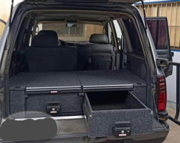 Slide Kitchen Drawer Systems For Land Cruiser 80 LC 80 by Forza Performance  Simplify the storage and organization of equipment and valuables. These lockable drawers with integrated deck and faceplates were designed specifically for the Toyota Land Cruiser 80. Hide the contents from prying eyes, while creating a more convenient and easily accessible storage space in your car. Designed solidly for tough for both on and off-road travel.
