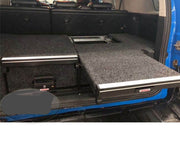 Slide Kitchen Drawer Systems For Toyota FJ Cruiser by Forza Performance  Simplify the storage and organization of equipment and valuables. These lockable drawers with integrated deck and faceplates were designed specifically for the Toyota FJ Cruiser. Hide the contents from prying eyes, while creating a more convenient and easily accessible storage space in your car. Designed solidly for tough for both on and off-road travel.