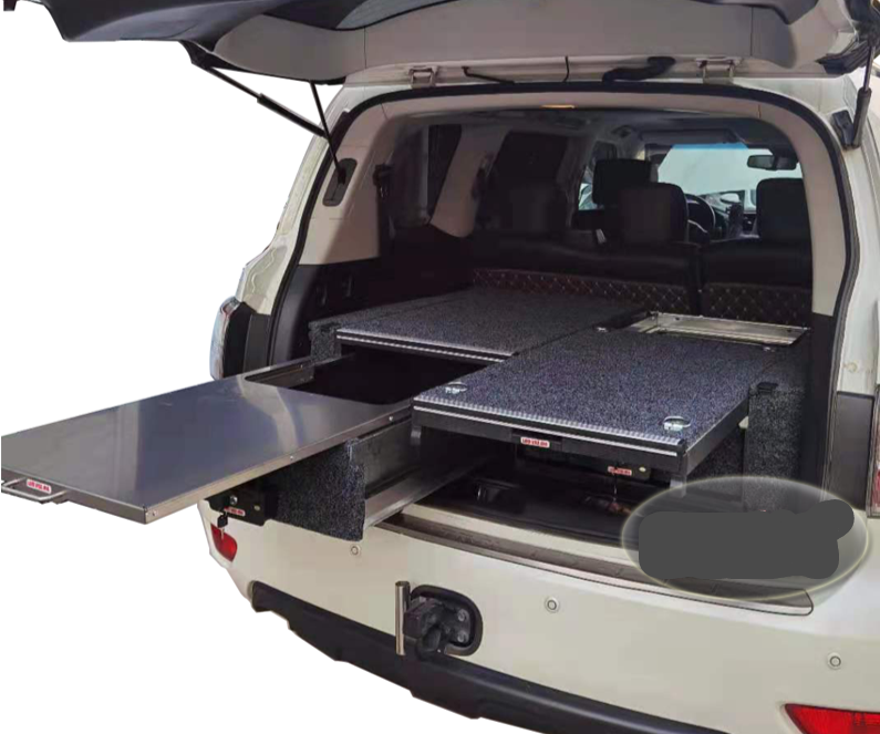 Slide Kitchen Drawer Systems For Nissan Patrol Y62 by Forza Performance  Simplify the storage and organization of equipment and valuables. These lockable drawers with integrated deck and faceplates were designed specifically for the Nissan Patrol Y62. Hide the contents from prying eyes, while creating a more convenient and easily accessible storage space in your car. Designed solidly for tough for both on and off-road travel.