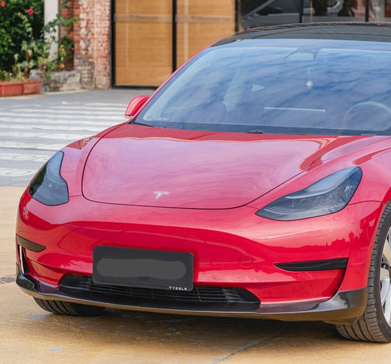 Forza Dry Carbon Front Lip For Tesla Model 3 2016+  Set Incude:  Front Lip Material: Dry Carbon  NOTE: Professional installation is required.