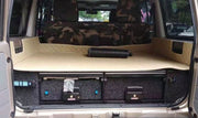 Slide Kitchen Drawer Systems For Land Cruiser 76 LC 76 by Forza Performance  Simplify the storage and organization of equipment and valuables. These lockable drawers with integrated deck and faceplates were designed specifically for the Toyota Land Cruiser 76. Hide the contents from prying eyes, while creating a more convenient and easily accessible storage space in your car. Designed solidly for tough for both on and off-road travel.