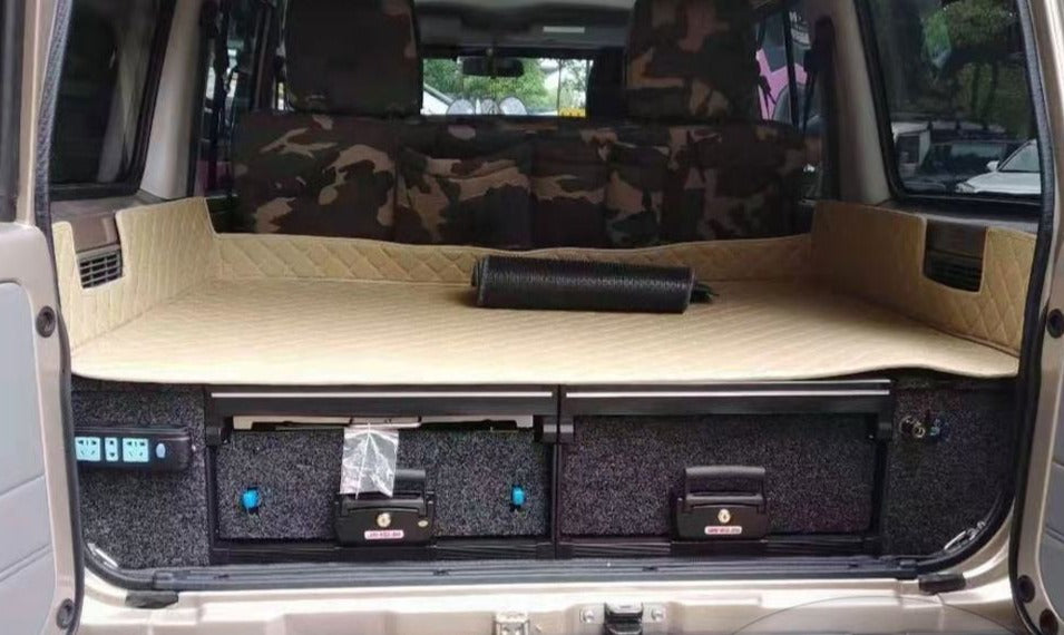Slide Kitchen Drawer Systems For Land Cruiser 76 LC 76 by Forza Performance  Simplify the storage and organization of equipment and valuables. These lockable drawers with integrated deck and faceplates were designed specifically for the Toyota Land Cruiser 76. Hide the contents from prying eyes, while creating a more convenient and easily accessible storage space in your car. Designed solidly for tough for both on and off-road travel.