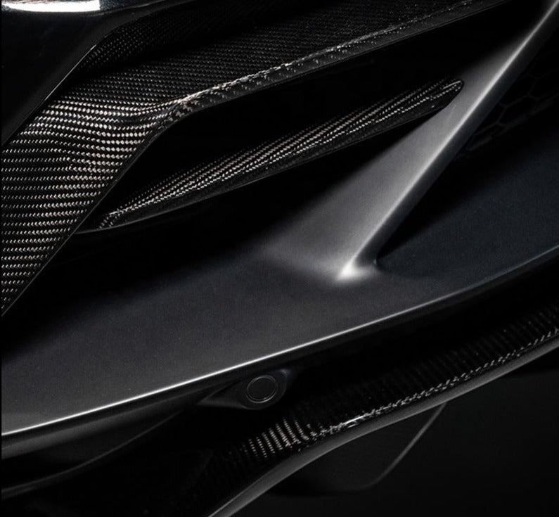 Forza Dry Carbon Rear Bumper Trims For Lamborghini Huracan 2014+  Set include: Trims Material: Dry Carbon  NOTE: Professional installation is required during installation