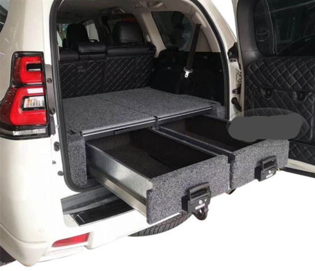 Slide Kitchen Drawer Systems For Land Cruiser Prado 150 LC 150 by Forza Performance  Simplify the storage and organization of equipment and valuables. These lockable drawers with integrated deck and faceplates were designed specifically for the Toyota Land Cruiser Prado 150. Hide the contents from prying eyes, while creating a more convenient and easily accessible storage space in your car. Designed solidly for tough for both on and off-road travel