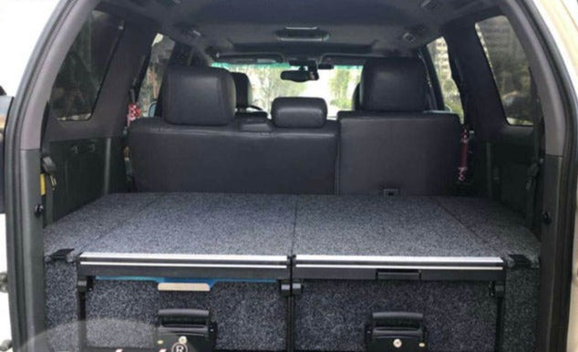 Slide Kitchen Drawer Systems For Land Cruiser Prado 120 LC 120 by Forza Performance  Simplify the storage and organization of equipment and valuables. These lockable drawers with integrated deck and faceplates were designed specifically for the Toyota Land Cruiser Prado 120. Hide the contents from prying eyes, while creating a more convenient and easily accessible storage space in your car. Designed solidly for tough for both on and off-road travel.