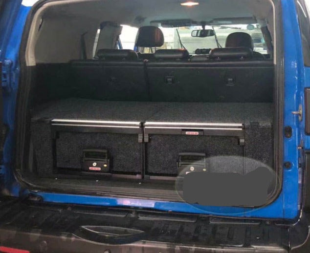 Slide Kitchen Drawer Systems For Toyota FJ Cruiser by Forza Performance  Simplify the storage and organization of equipment and valuables. These lockable drawers with integrated deck and faceplates were designed specifically for the Toyota FJ Cruiser. Hide the contents from prying eyes, while creating a more convenient and easily accessible storage space in your car. Designed solidly for tough for both on and off-road travel.