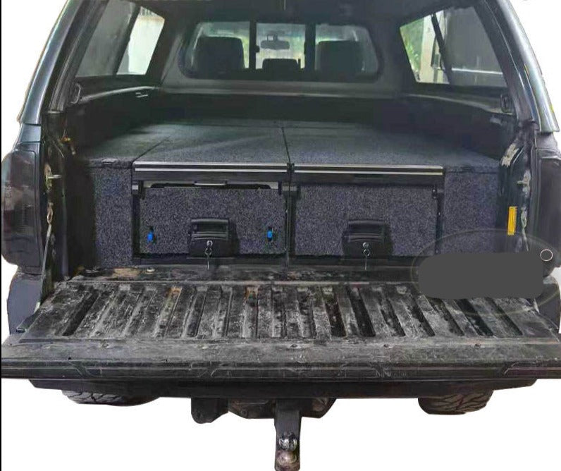 Slide Kitchen Drawer Systems For Toyota Tacoma 2015-2018+ by Forza Performance  Simplify the storage and organization of equipment and valuables. These lockable drawers with integrated deck and faceplates were designed specifically for the Toyota Tacoma 2015-2018. Hide the contents from prying eyes, while creating a more convenient and easily accessible storage space in your car. Designed solidly for tough for both on and off-road travel.