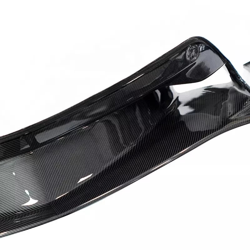 OEM Style Dry Carbon Body Kit For McLaren GT  Set Include:  Front Lip Side Skirts Rear Diffuser Material: Dry carbon  NOTE: Professional installation is required