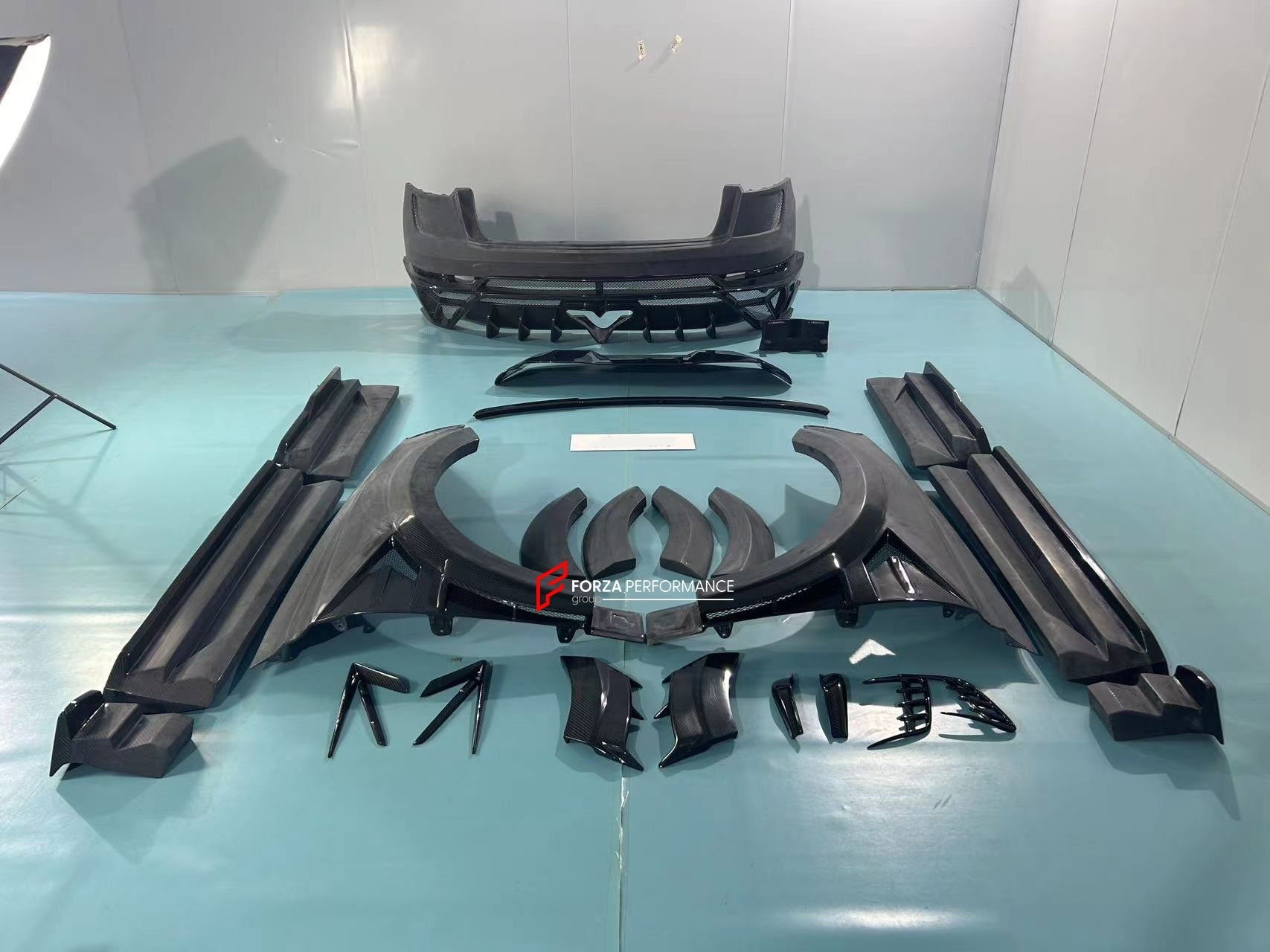 WIDE DRY CARBON BODY KIT FOR AUDI Q8 | RSQ8 4M 2019+   Set include:  Front Bumper Assembly Front Bumper Canards Hood/Bonnet Front Fenders Fender Flares Side Skirts Rear Roof Spoiler Trunk Wing Spoiler Exhaust system Rear Bumper Rear Diffuser