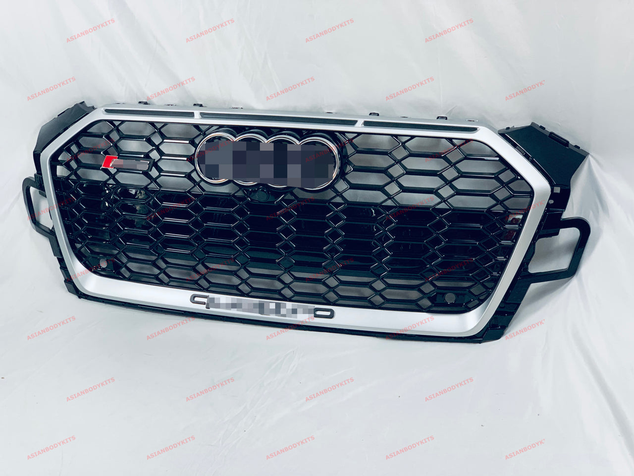 RS5 style FRONT GRILLE assembly for Audi A5 S5 F5 Coupe / Cabriolet / Sportback 2019+ Have PDC holes  License plate holder 1pc (for EURO or China regions) Include badges Include front camera housing with cap Color: Silver frame with black mesh  Material: ABS Plastic  Note: Professional installation is required, on some A5 models PDC sensors brackets can be in clash with hit bar, so you need to modify PDC sensors or hit bar  *If you have front camera, you need to remove it and GLUE to new RS grille