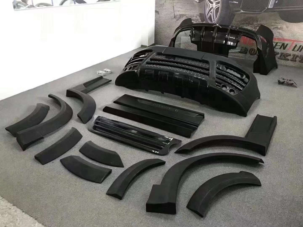 WIDE BODY KIT for LAND ROVER RANGE ROVER SPORT MODEL 2014-2017 L494
Set includes:
Front Bumper Assemby
Front Grille
Fender Flares
Side Skirts
Rear Bumper Assemby
Rear Diffuser
Exhaust Tips
Material: Fiberglass
Note:Professional installation is required
CONTACT US FOR PRICING