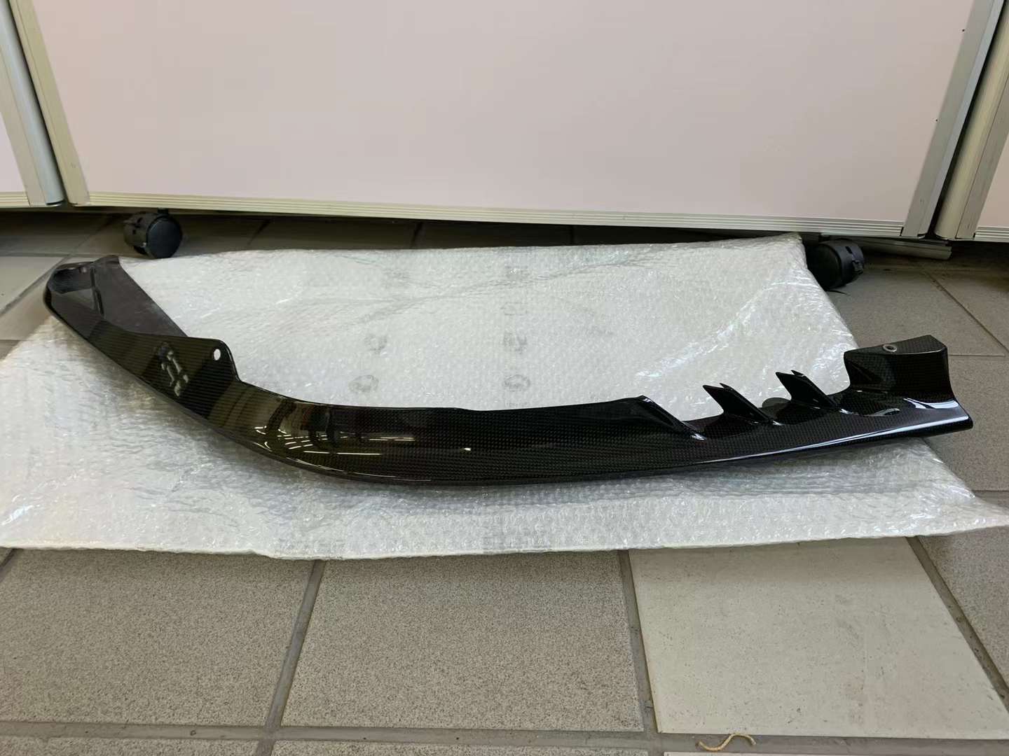 CARBON OEM GENUINE PARTS for FERRARI SF90 2021+  Set includes:  Front Lip Front Trims Side Skirts Side Vents Rear Diffuser Rear Spoiler Wing Material: Carbon Fiber  NOTE: Professional installation is required.  Contact us for pricing