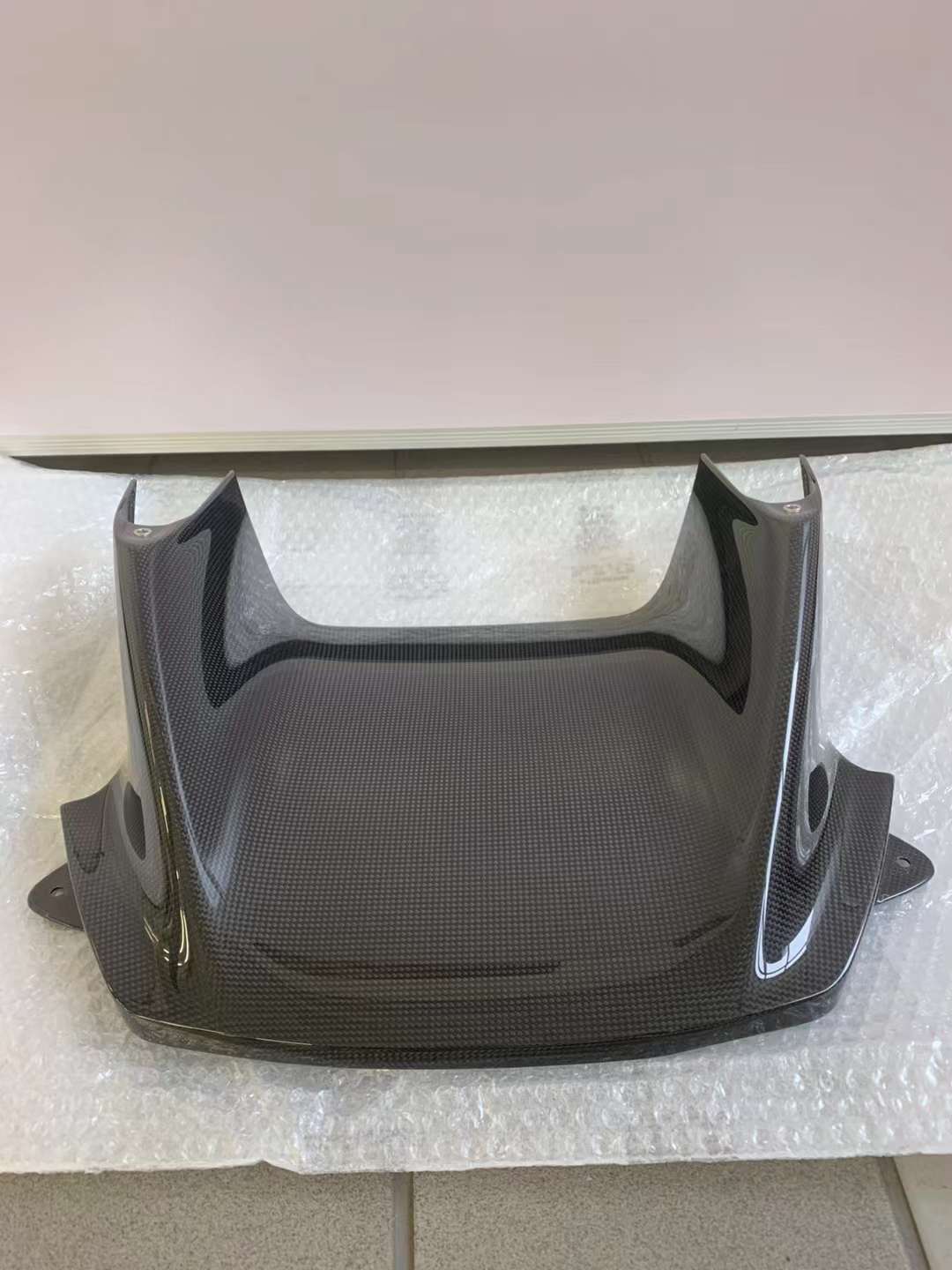 CARBON OEM GENUINE PARTS for FERRARI SF90 2021+  Set includes:  Front Lip Front Trims Side Skirts Side Vents Rear Diffuser Rear Spoiler Wing Material: Carbon Fiber  NOTE: Professional installation is required.  Contact us for pricing