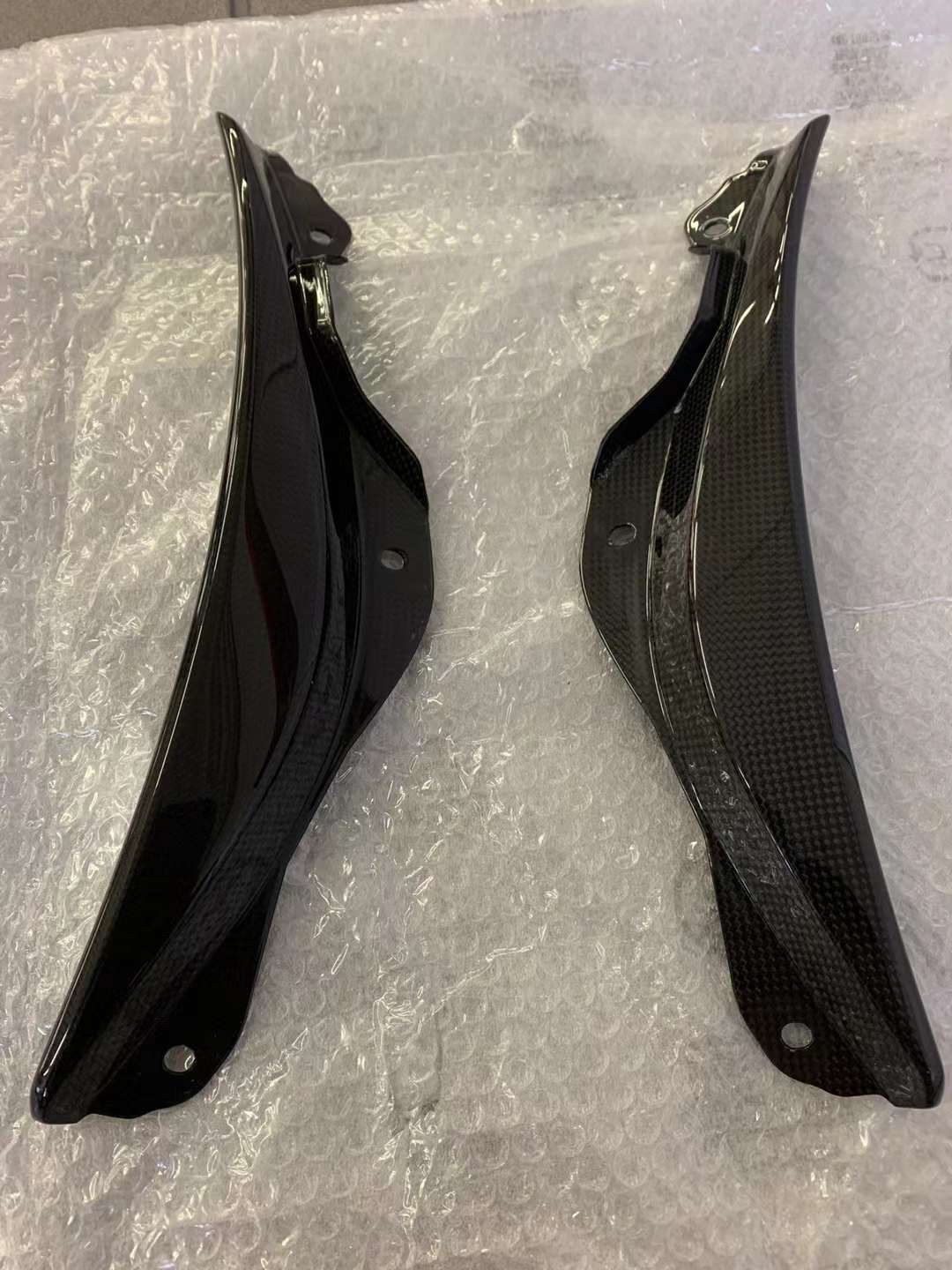 CARBON OEM GENUINE PARTS for FERRARI SF90 2021+  Set includes:  Front Lip Front Trims Side Skirts Side Vents Rear Diffuser Rear Spoiler Wing Material: Carbon Fiber  NOTE: Professional installation is required.  Contact us for pricing