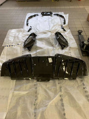 CARBON OEM GENUINE PARTS for FERRARI SF90 2021+  Set includes:  Front Lip Front Trims Side Skirts Side Vents Rear Diffuser Rear Spoiler Wing Material: Carbon Fiber  NOTE: Professional installation is required.  Contact us for pricing