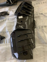 CARBON OEM GENUINE PARTS for FERRARI SF90 2021+  Set includes:  Front Lip Front Trims Side Skirts Side Vents Rear Diffuser Rear Spoiler Wing Material: Carbon Fiber  NOTE: Professional installation is required.  Contact us for pricing